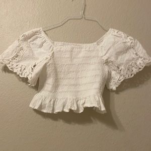 Cute white top and as a medium has no stains